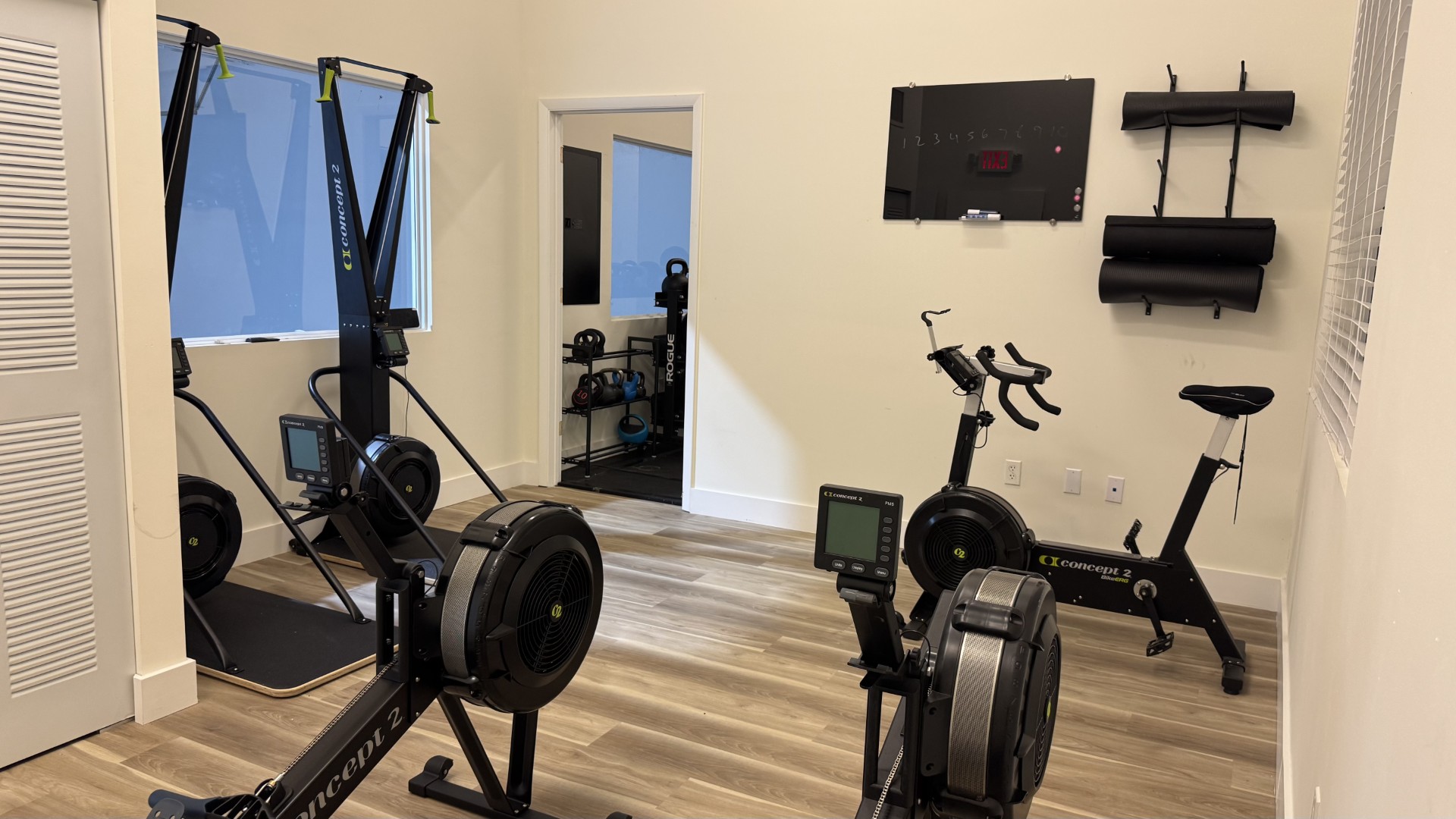 Concept2 rowers and bike in the conditioning room